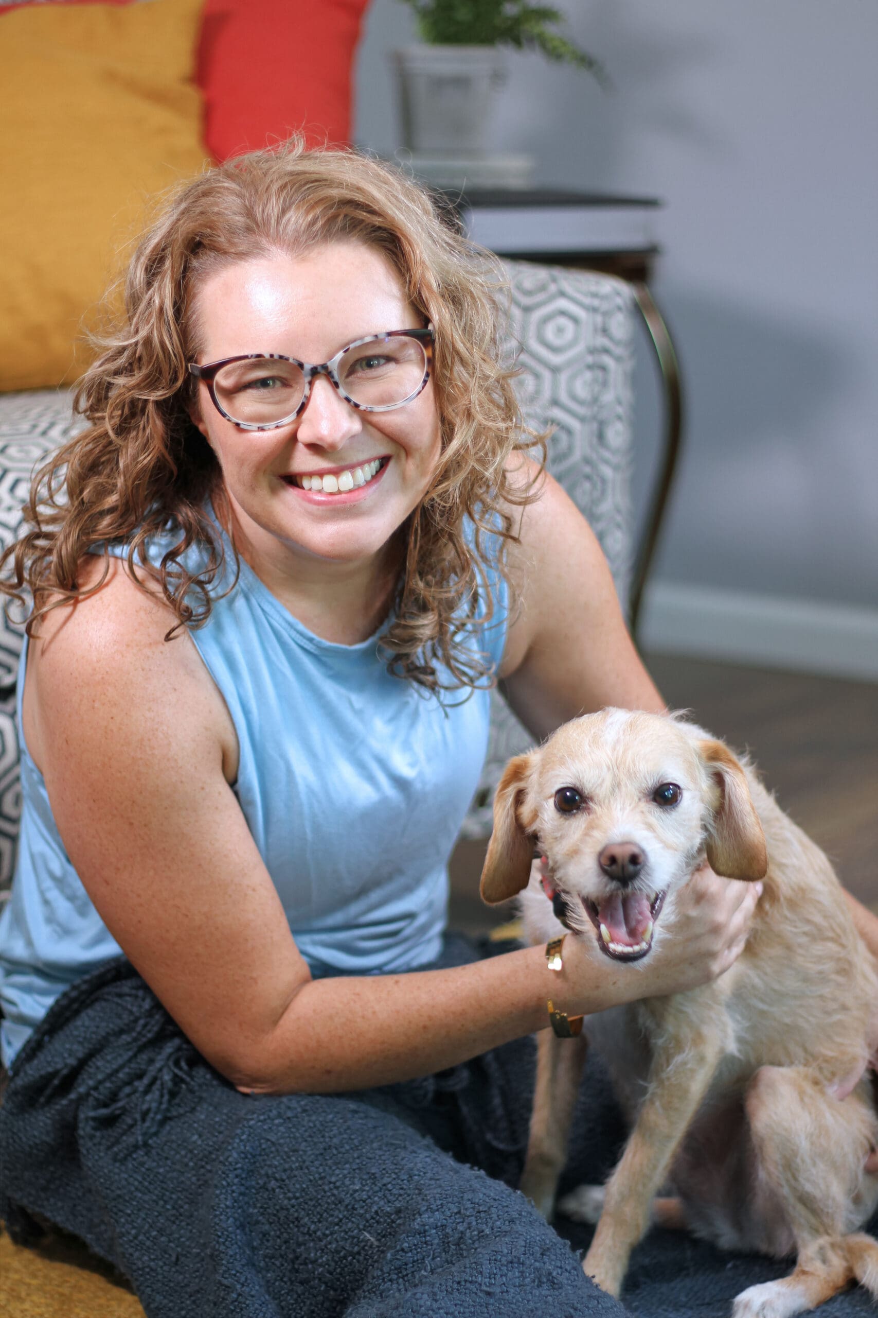 Mary Beth Lynn, Travel Advisor Systems and Inbox Expert, with her dog, Sadie.