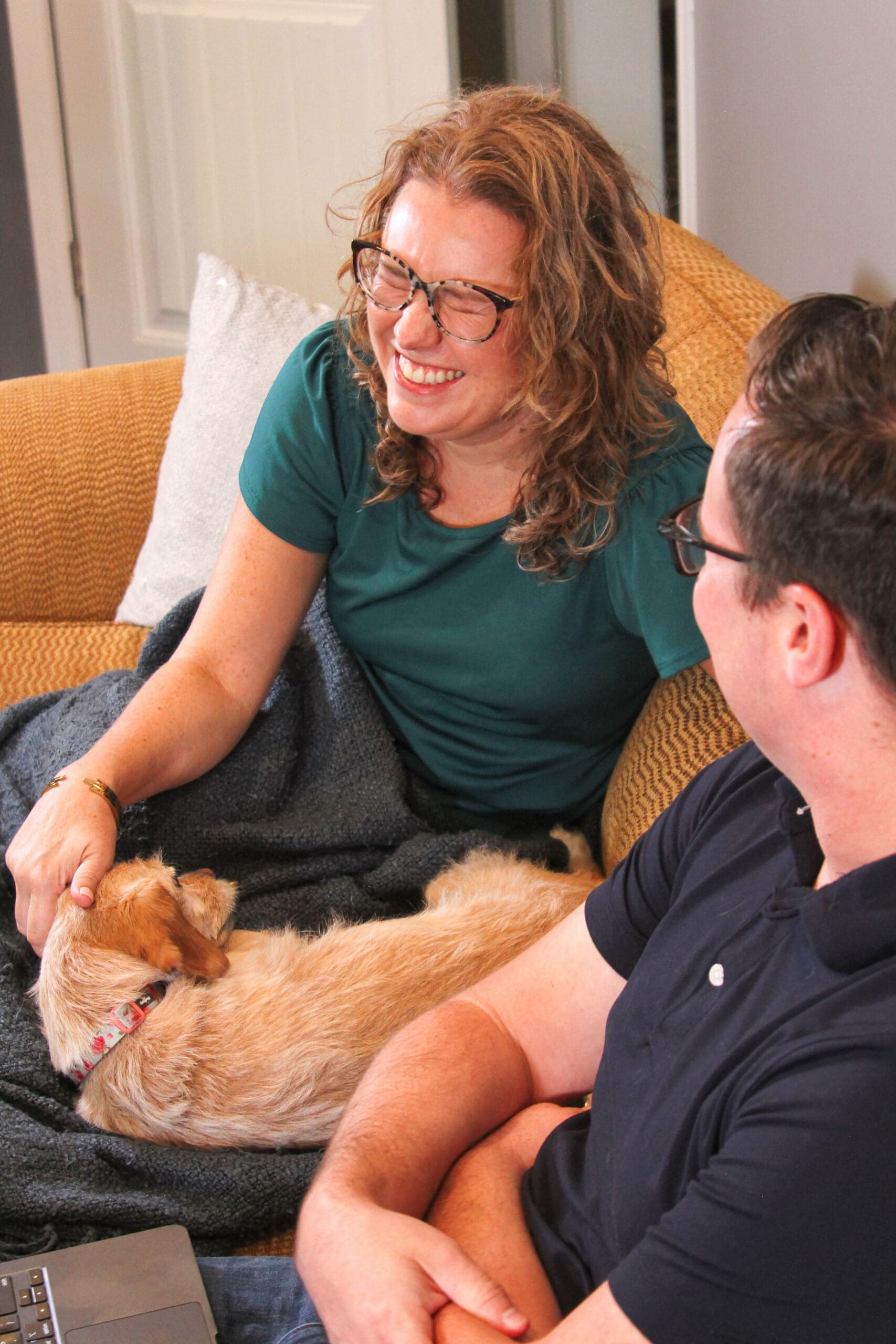 Mary Beth Lynn, Travel Agent Systems and Assistants Expert, with her husband, Robbie Lynn, and dog, Sadie.