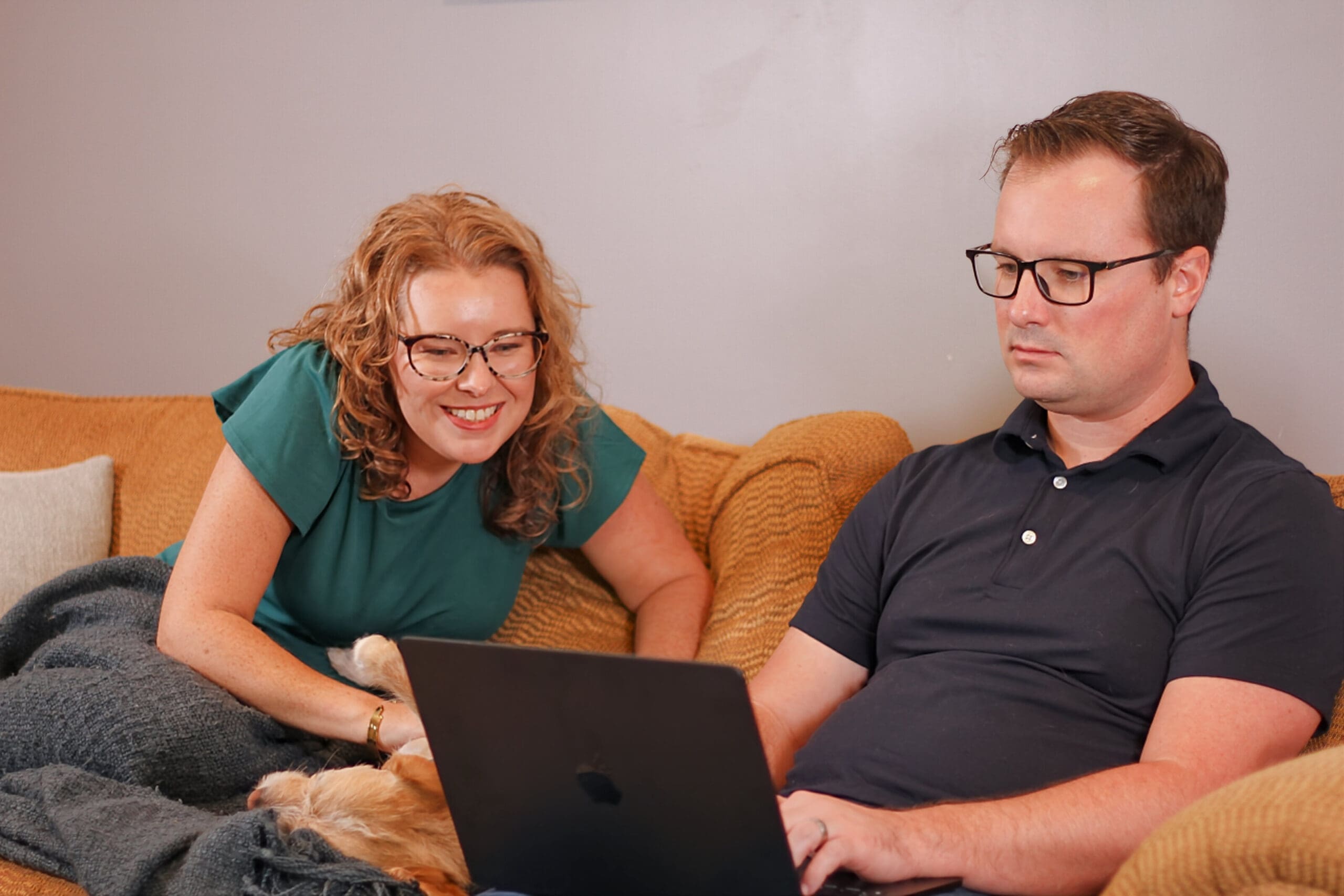 Mary Beth Lynn with her husband, Robbie Lynn, working on their Gold Couch.